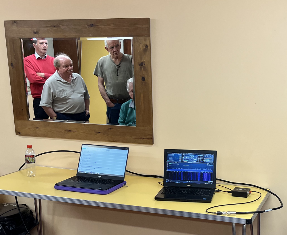 Kiwi WebSDR server list and waterfall demonstration on Ubuntu laptop, left, SDRPlay RSPdx and SDRuno on Win7 laptop, right