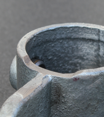 A bench grinder made short work of removing the small amount of material necessary